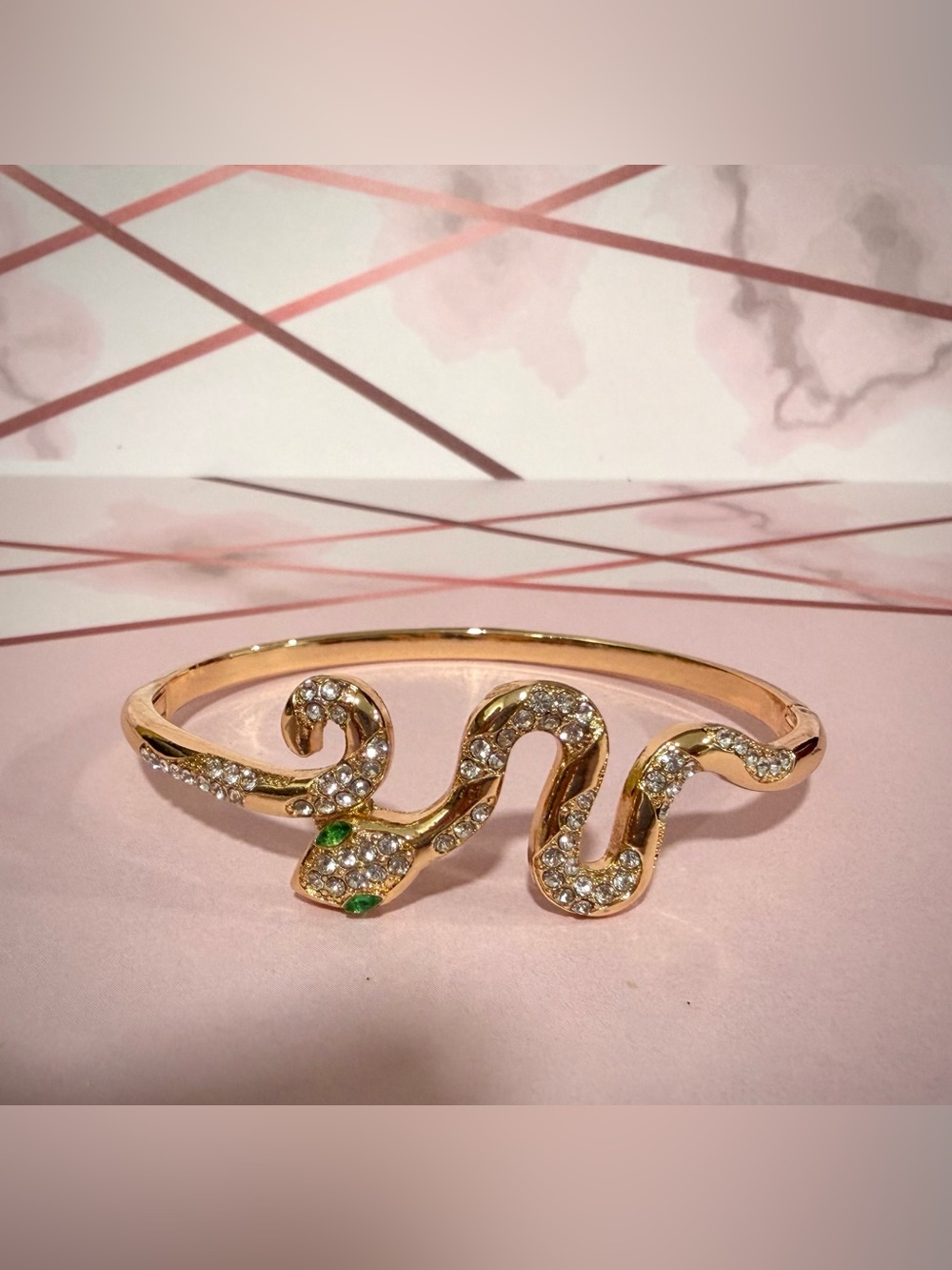 Gold Snake Ring with Pavé Crystals and Green Eye
